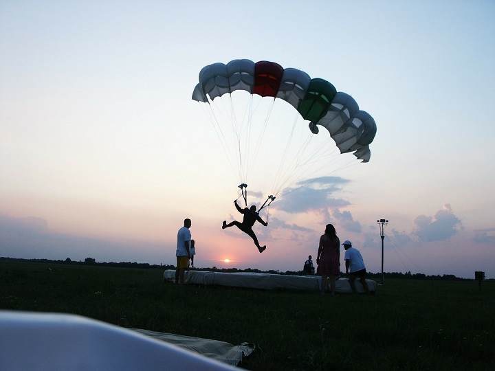 Air resistance breaks the fall of parachute