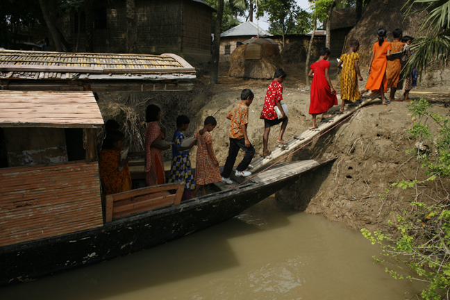 Children getting off the boat school